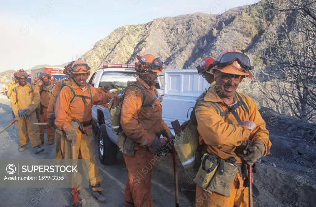 Fire fighters packing up after a fire, Los Angeles Padres National Forest, California