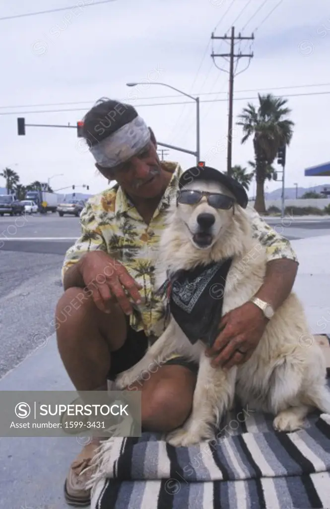 A homeless man and his dog will work for food