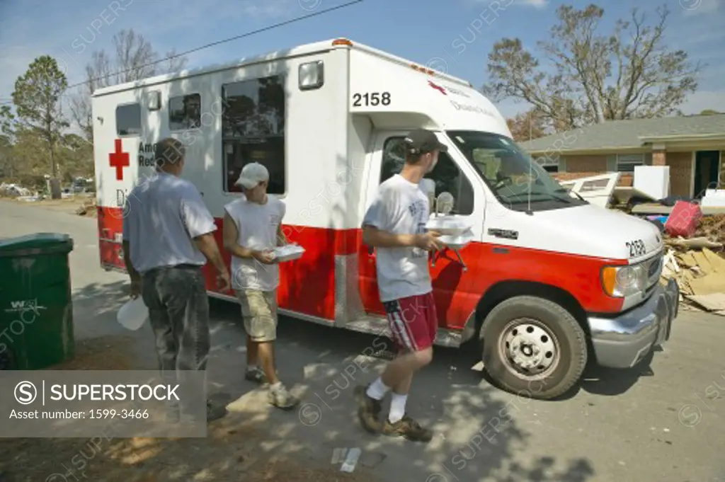 Victims of Hurricane Ivan in Pensacola Florida suburb come to Red Cross emergency for food, water and ice
