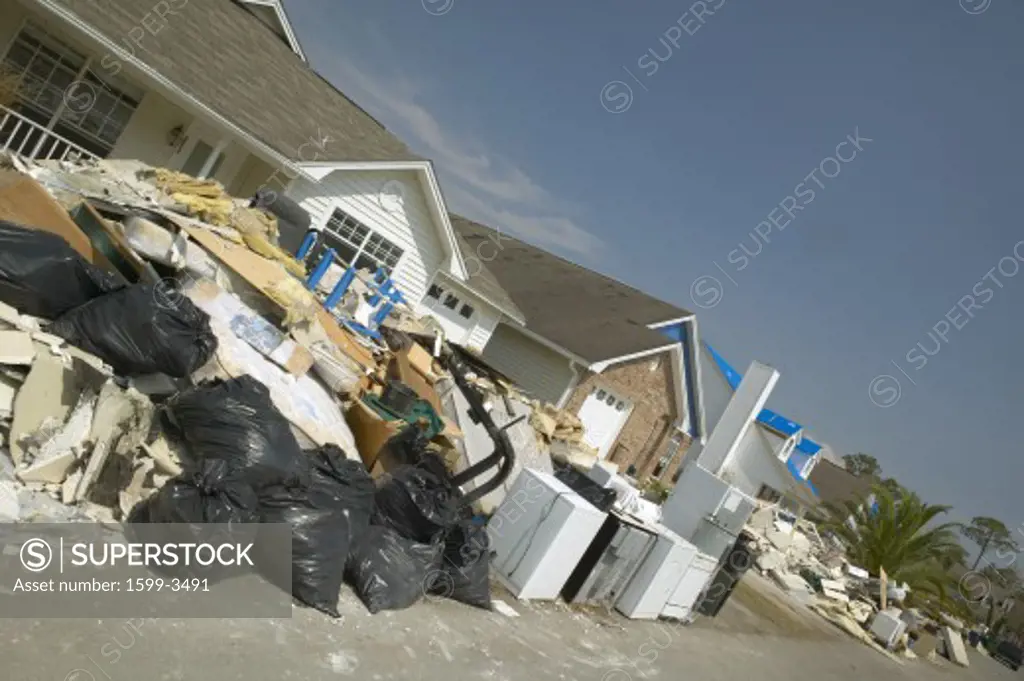Row of suburban houses with debris after Hurricane Ivan in Pensacola Florida