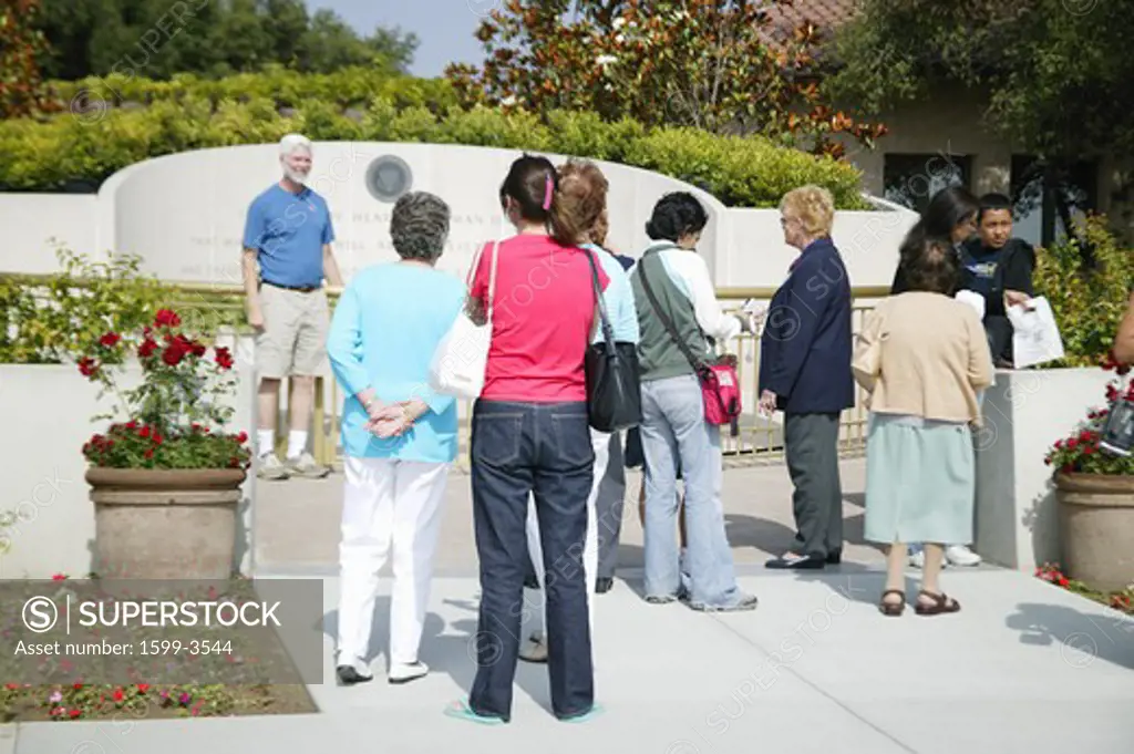 Visitors at the memorial with Reagan quotation at the Ronald W. Reagan Presidential Library