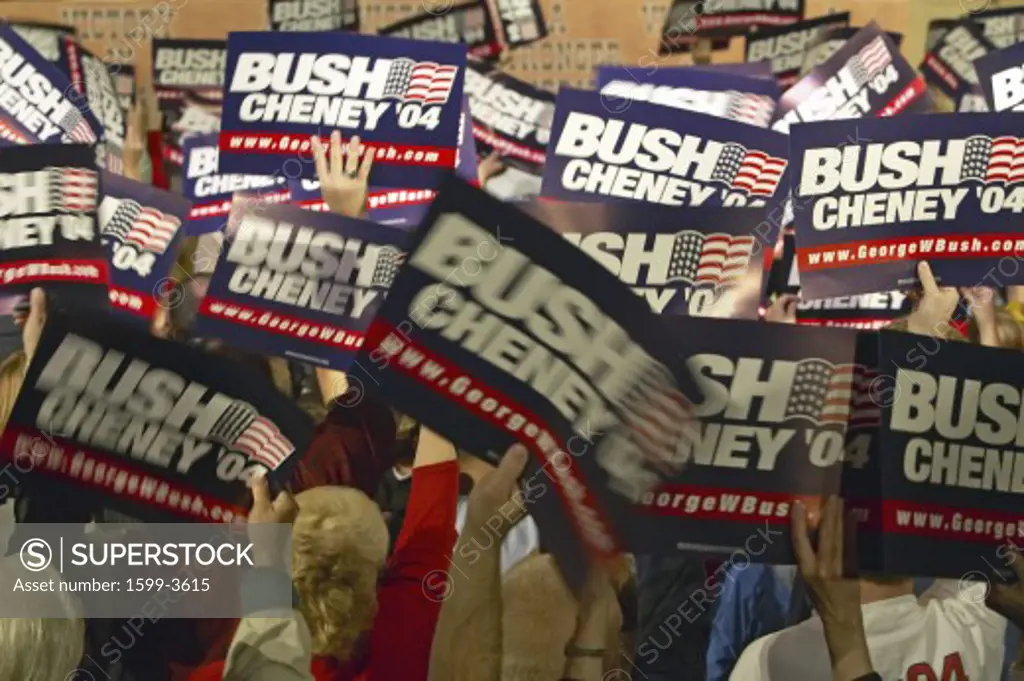 Bush/Cheney signs held by supporters at campaign rally attended by Vice Presidential candidate Dick Cheney, 2004