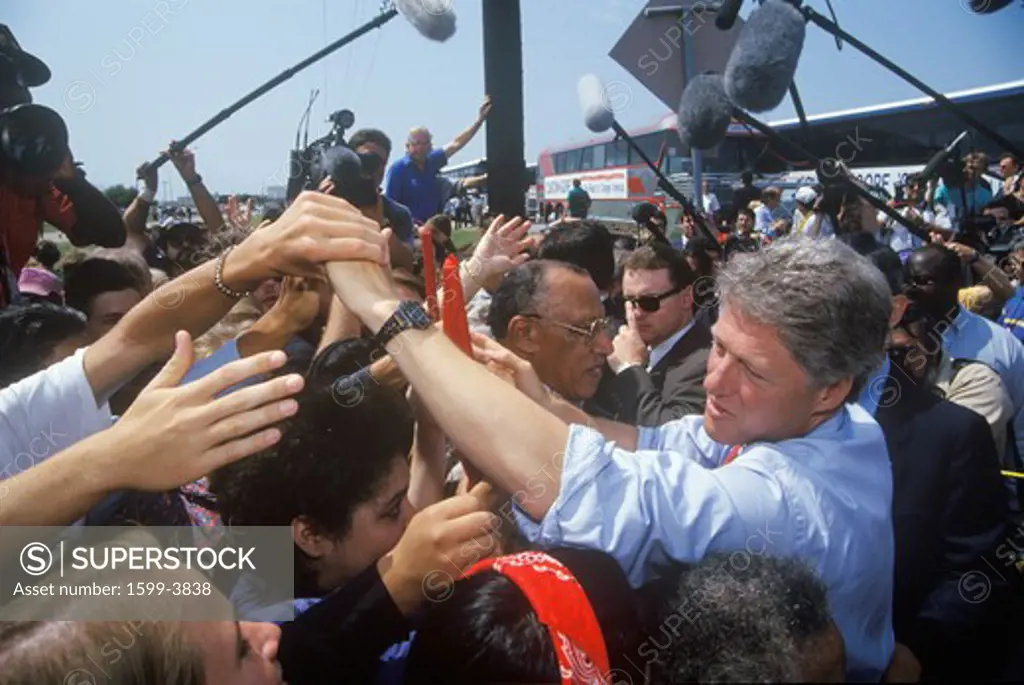 Governor Bill Clinton shakes hands at an unscheduled bus stop on the Clinton/Gore 1992 Buscapade campaign tour in Texas