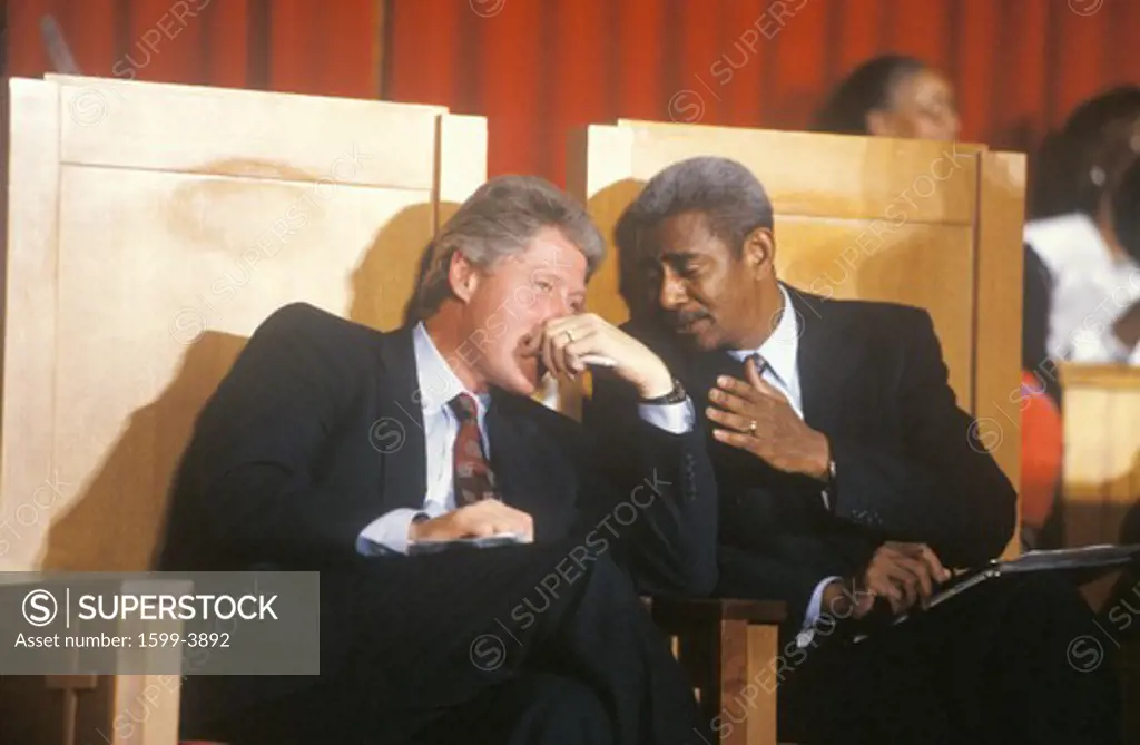 Governor Bill Clinton converses with Reverend Otis Moss at the Olivet Baptist Church in Cleveland, Ohio during the Clinton/Gore 1992 Buscapade Great Lakes campaign tour