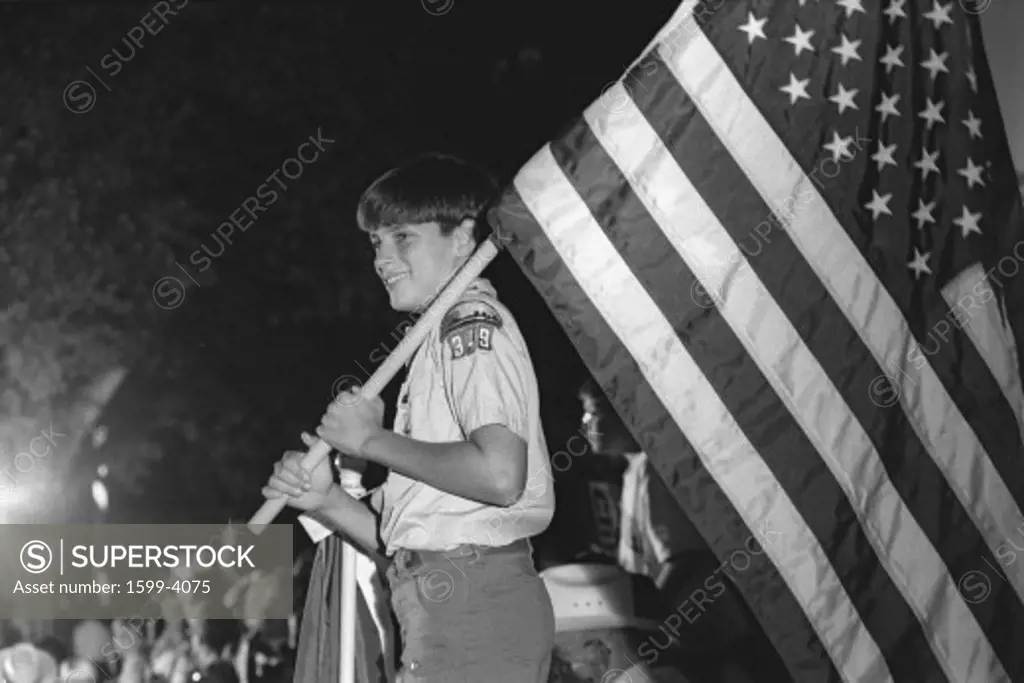 Boy Scout carries the American flag at a DNC Fundraiser in New York City, 1992