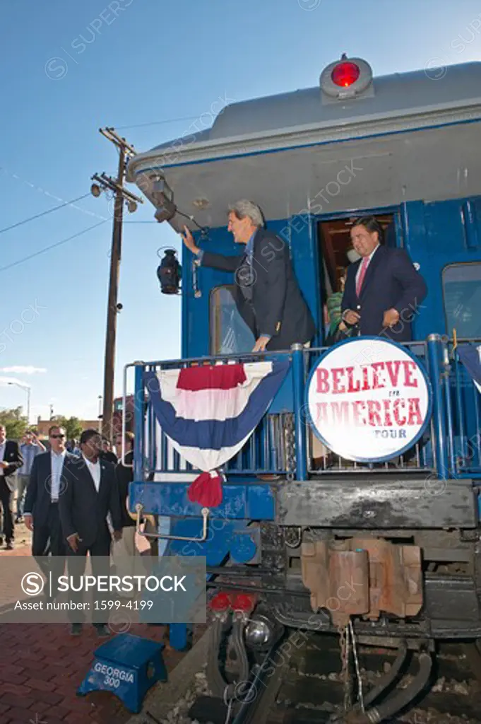 Senator and Mrs. John Kerry waving from back of Whistle Stop Kerry Express across America train, Gallup, NM