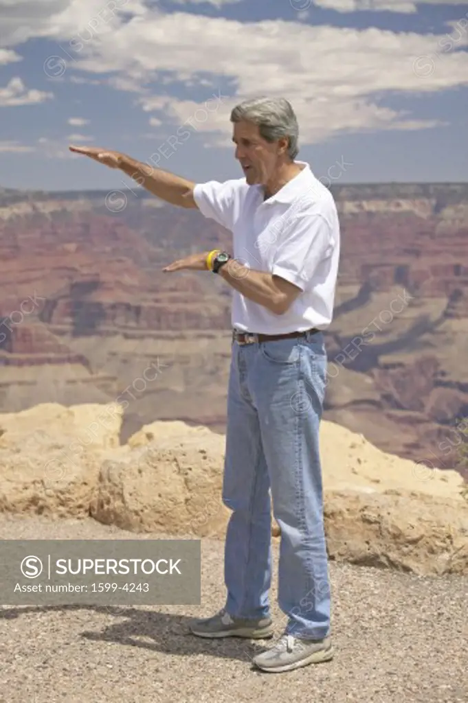 Senator John Kerry speaking at the rim of Bright Angel Lookout, Grand Canyon, AZ