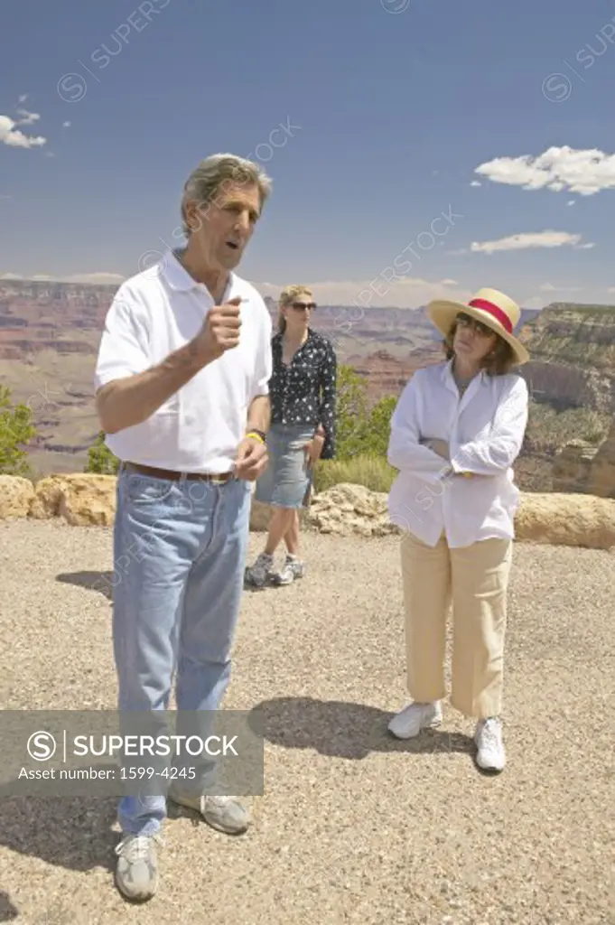 Senator John Kerry, with family,  speaking at rim of Bright Angel Lookout, Grand Canyon, AZ
