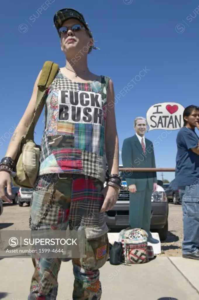 Protestor with a t-shirt that reads Fuck Bush at a George W. Bush protest rally in Tucson, AZ