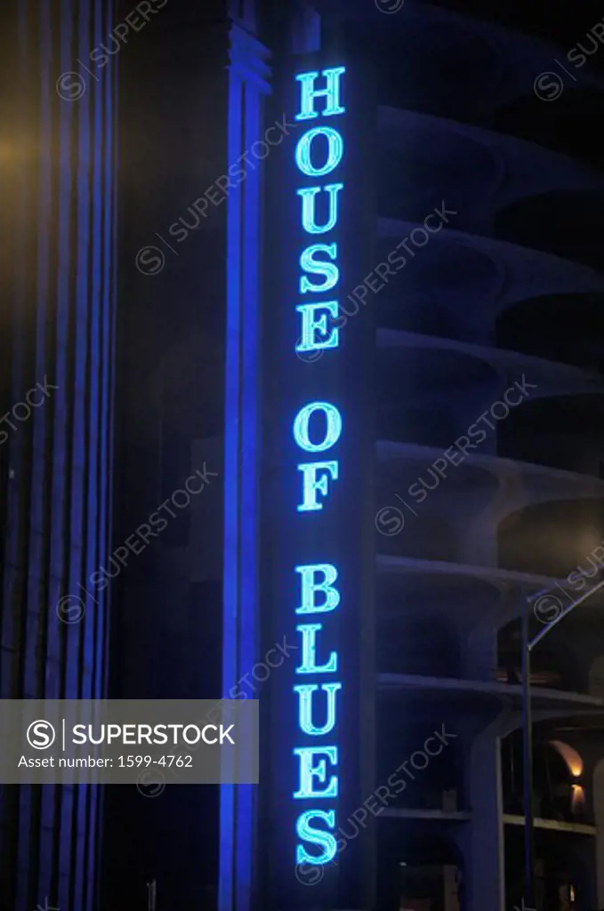 A neon sign that reads House of Blues”