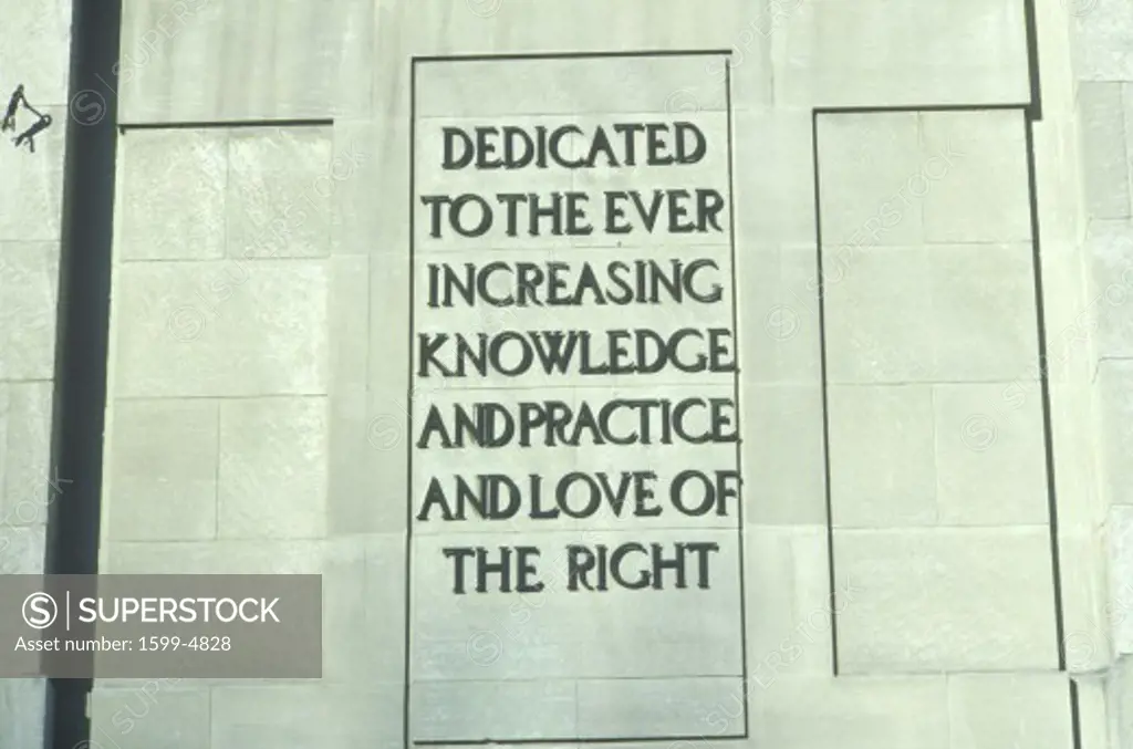 A sign that reads Dedicated to the ever increasing knowledge and practice and love of the right”