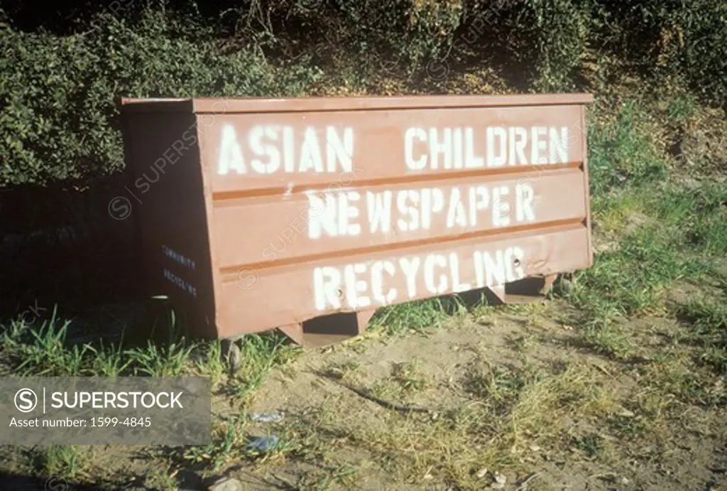 A sign that reads Asian Children Newspaper Recycling”