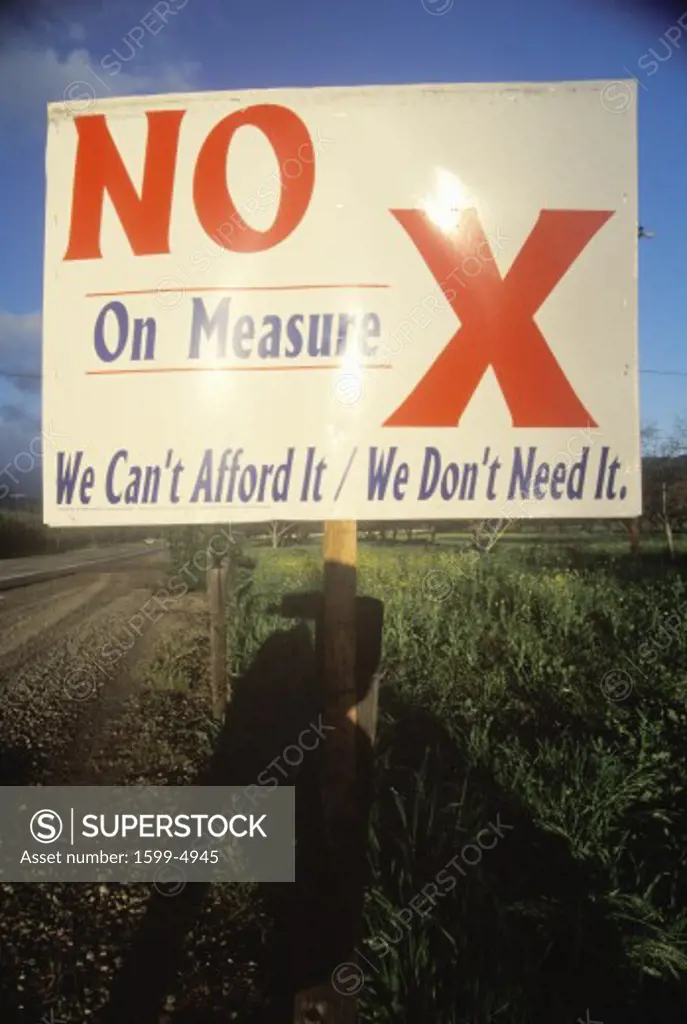 A sign that reads No on Measure X”