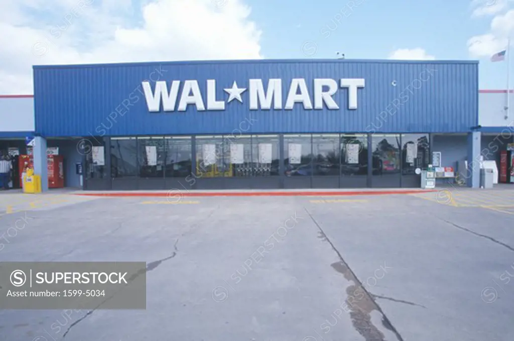 Wal * Mart Supercenter Store  front entrance and parking lot in Southeast USA