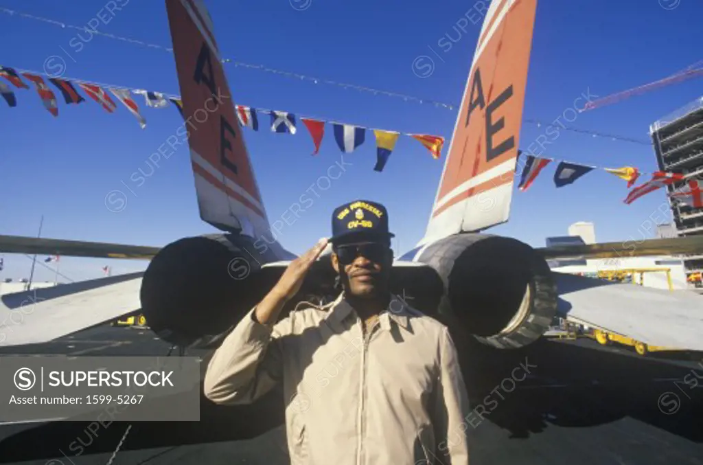 Afro-American Soldier Saluting By Aircraft, USS Forrestal, New Orleans, Louisiana