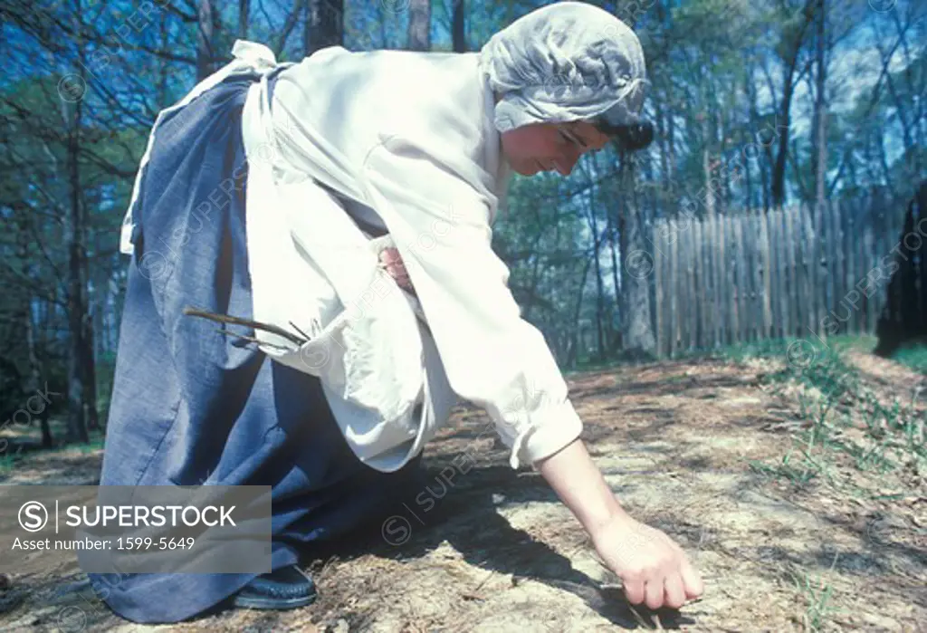 Participant working in garden in historic Jamestown, Virginia, site of the first English Colony