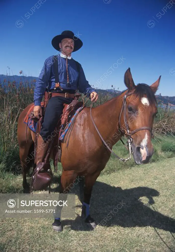 Participant on horseback during Cowboy Reenactment, Lake Casitas, Ojai, CA