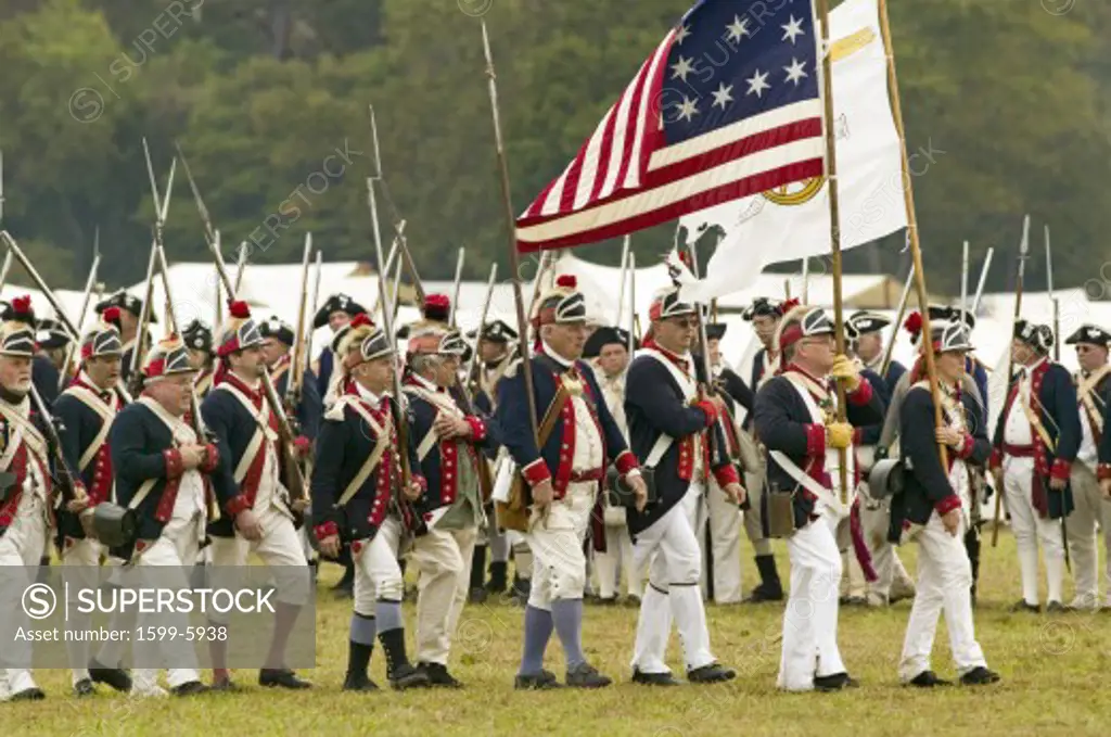 Patriot soldiers march to Surrender Field as part of the 225th Anniversary of the Victory at Yorktown, a reenactment of the siege of Yorktown, where General George Washington commanded 17,600 American troops and French Comte de Rochambeau lead 5500 French troops, together defeating General Lord Cornwallis, who surrendered his arms on October 19, 1781, ending the Revolutionary War, thus making the 13 Colonies the United States of America, an independent nation. On October 19-22, 2006, the Yorktow