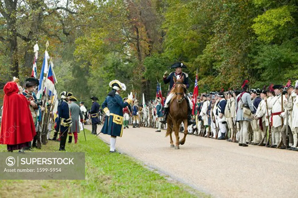Major General Benjamin Lincoln on horseback rides down Surrender Road at the 225th Anniversary of the Victory at Yorktown, a reenactment of the siege of Yorktown, where General George Washington commanded 17,600 American troops and French Comte de Rochambeau lead 5500 French troops, together defeating General Lord Cornwallis, who surrendered his arms on October 19, 1781, ending the Revolutionary War, thus making the 13 Colonies the United States of America, an independent nation. On October 19-2