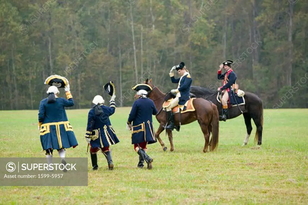 General Washington and aid salute the French staff including Comte De Grasse and General Rochambeau at the 225th Anniversary of the Victory at Yorktown, a reenactment of the siege of Yorktown, where General George Washington commanded 17,600 American troops and French Comte de Rochambeau lead 5500 French troops, together defeating General Lord Cornwallis, who surrendered his arms on October 19, 1781, ending the Revolutionary War, thus making the 13 Colonies the United States of America, an indep