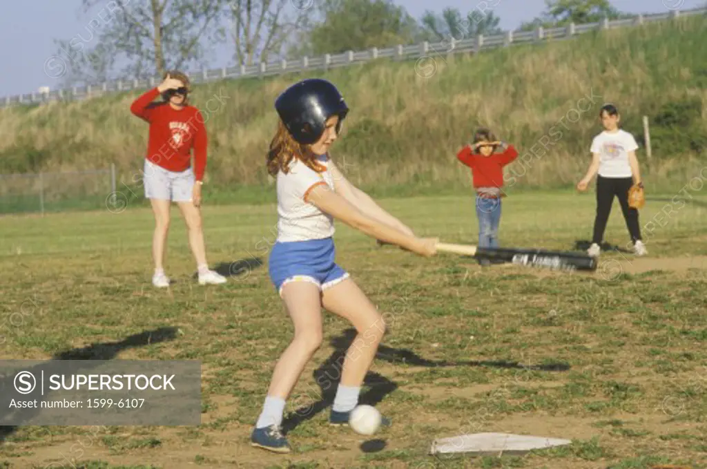 Girl at bat at Girls Baseball game in Southern Indiana
