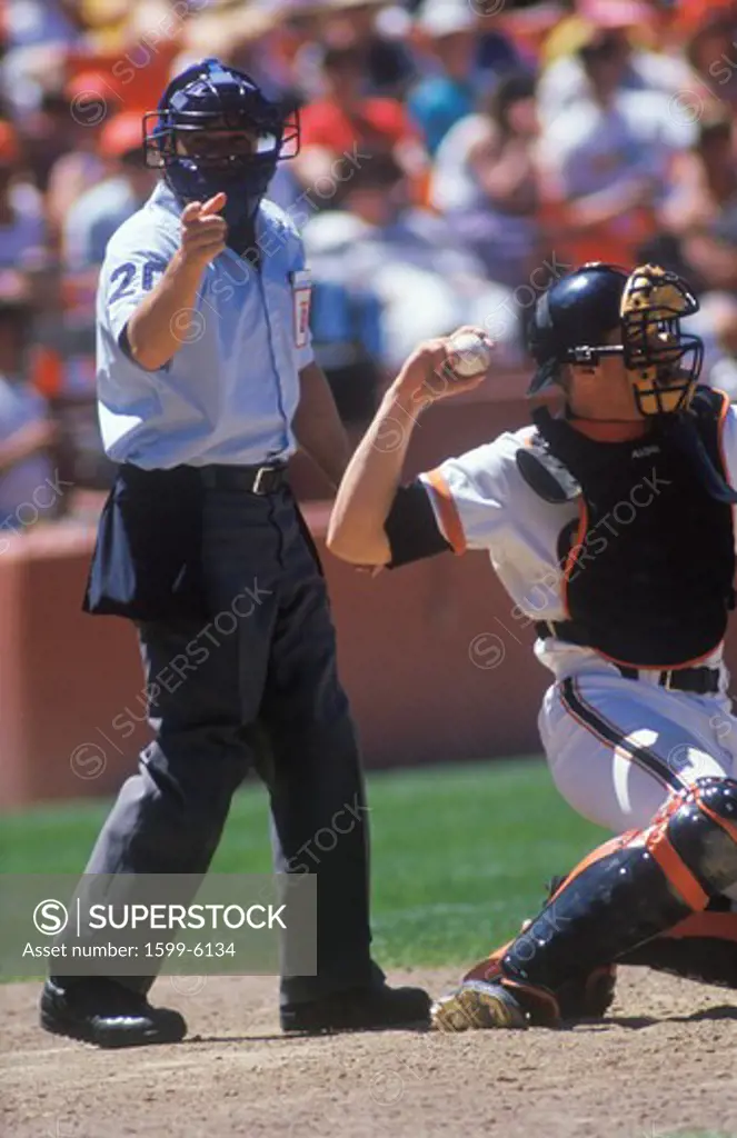 Close-up of umpire and pitcher during professional Baseball game, Dodger Stadium, Los Angeles, CA