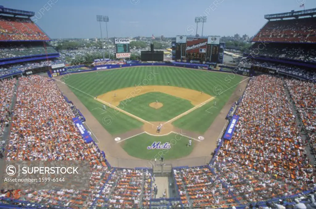 Long view of diamond and bleachers during professional Baseball game, Shea Stadium, NY