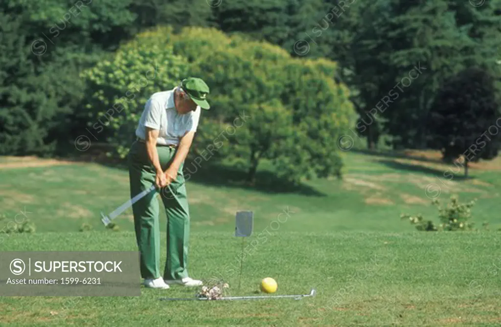 Senior golfer on course, Columbia Country Club, Bethesda, Maryland