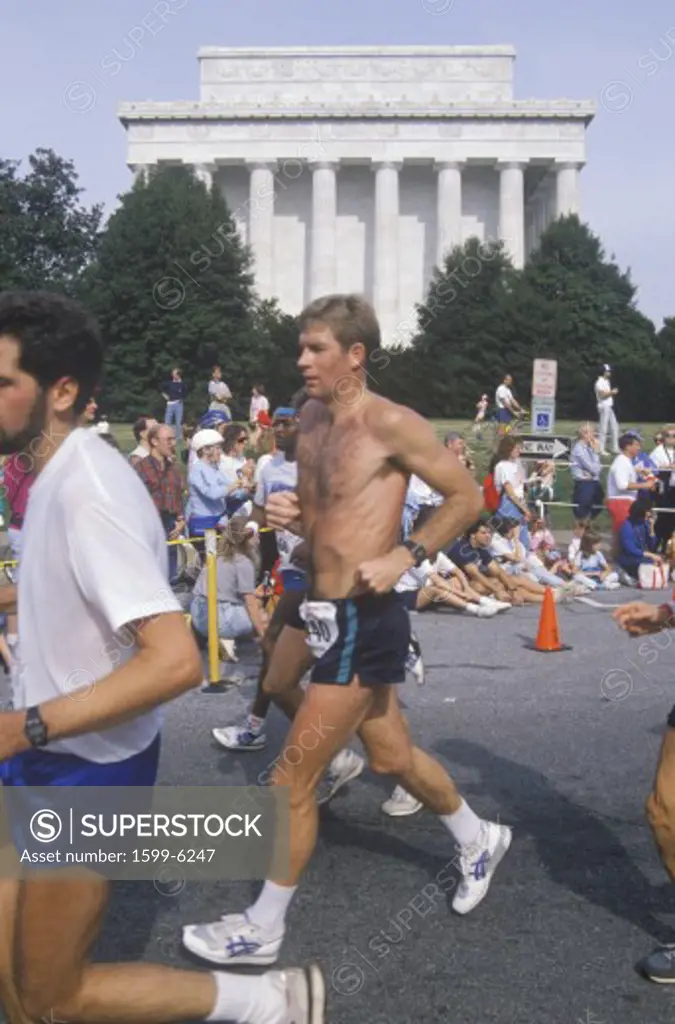 Close-up of runner in front of Lincoln Memorial, Washington, D.C.