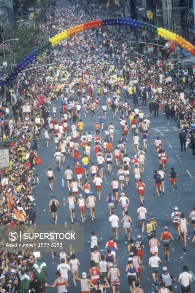 Crowd of runners crossing 1st Avenue/ 59th Street bridge, NY, NY City Marathon