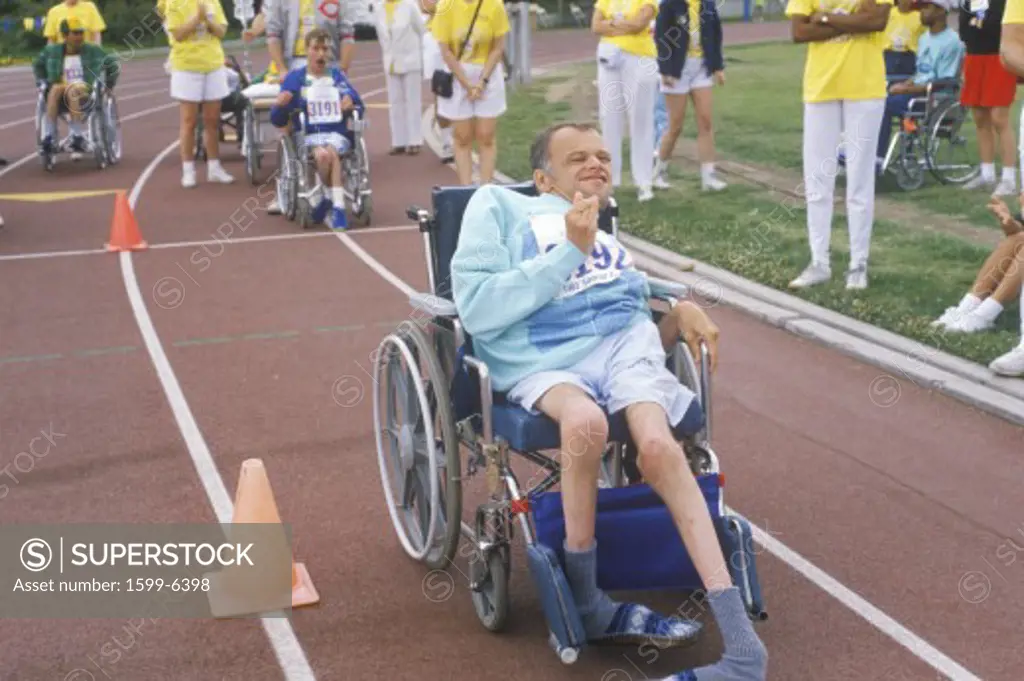 Special Olympics athlete in wheelchair, competing, UCLA, CA