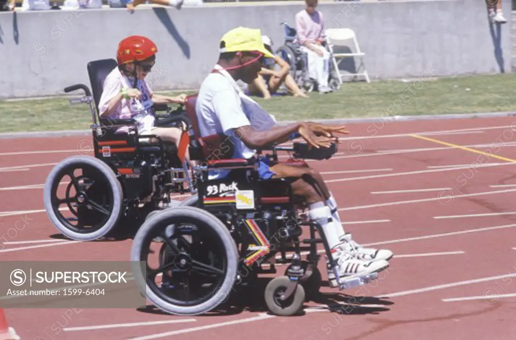 Wheelchair Special Olympics athletes competing in race, UCLA, CA
