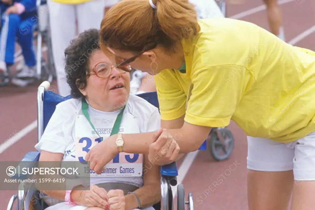Volunteer coaching wheelchair athlete, Special Olympics, UCLA, CA