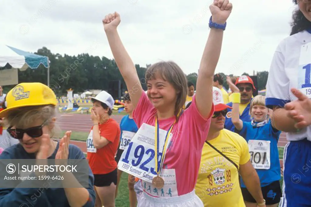Young Handicapped athlete celebrating during Special Olympics, UCLA, CA