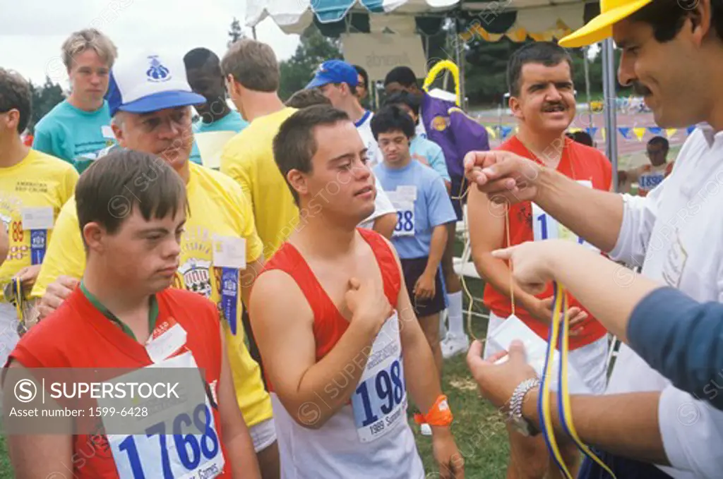 Handicapped Athletes cheering, Special Olympic games, UCLA, CA