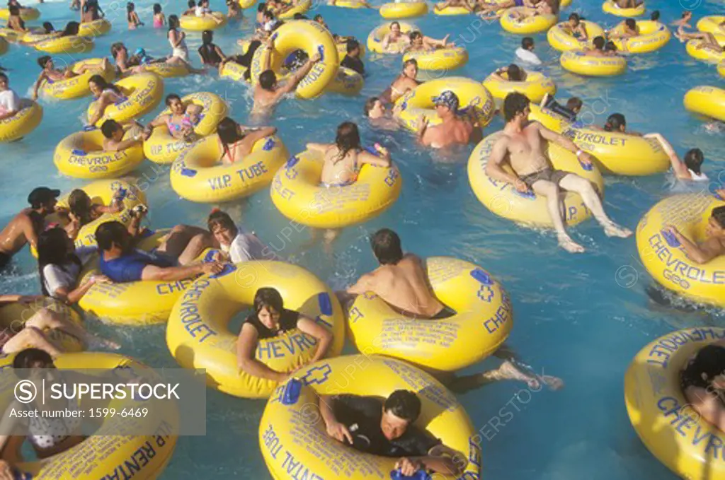 Crowd in water at Raging Waters amusement park, Los Angeles, CA