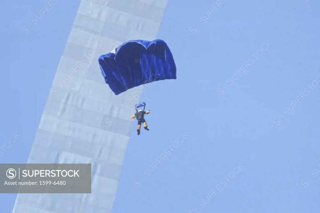 Parachutist over arch, St. Louis, Missouri