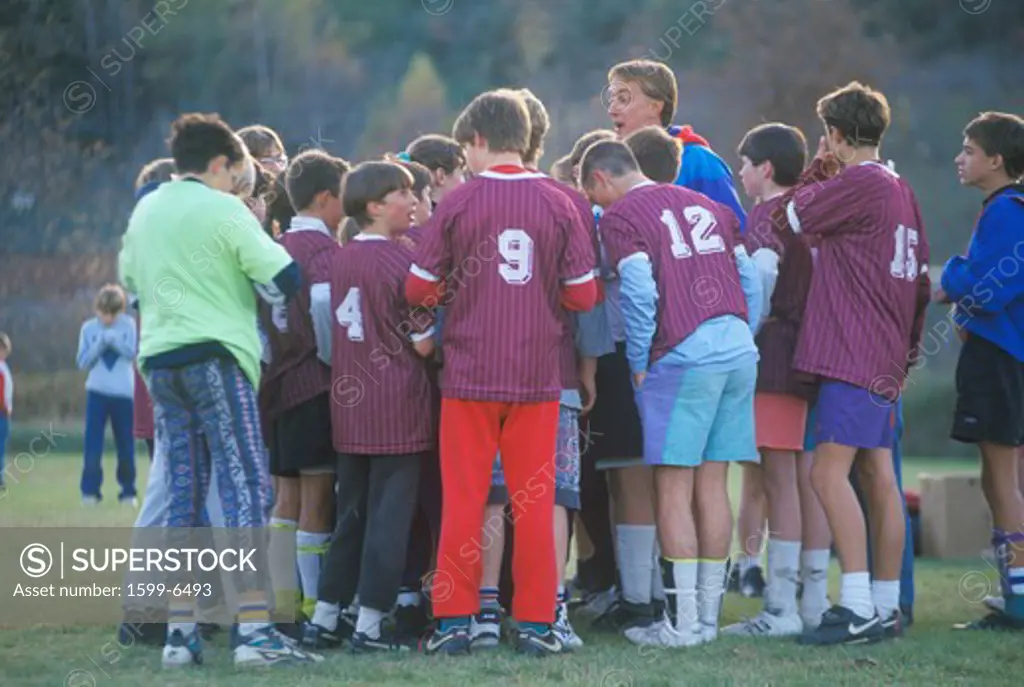 Group of young boys playing soccer, Lyndonville, Vermont