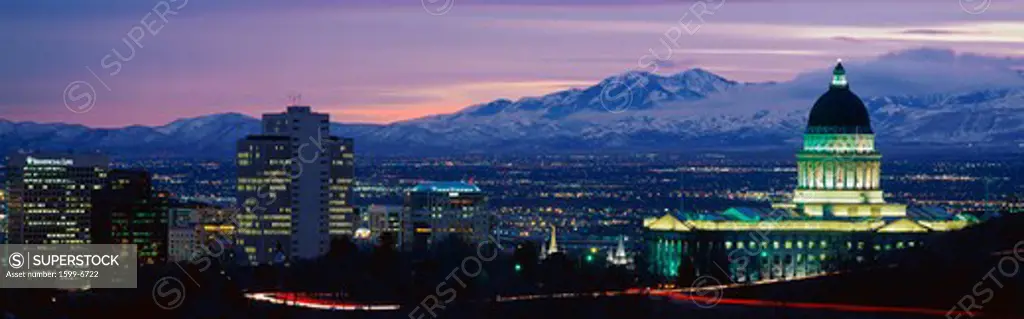 This is the State Capitol, Great Salt Lake and Snow Capped Wasatch Mountains at sunset. It will be the winter Olympic city for the year 2002.