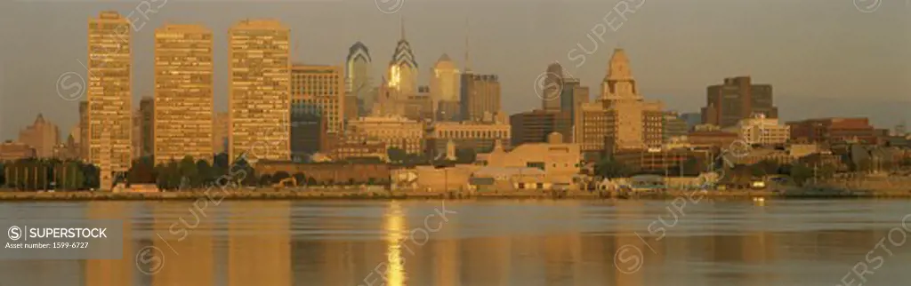 This is the skyline view from Camden, New Jersey. It shows sunrise on the river.