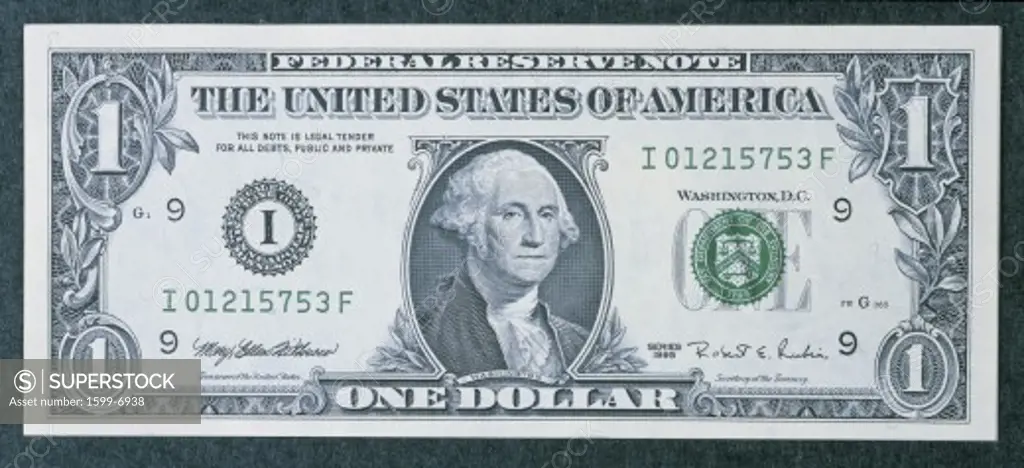 This is the front of a one dollar bill showing the portrait of George Washington in the center.