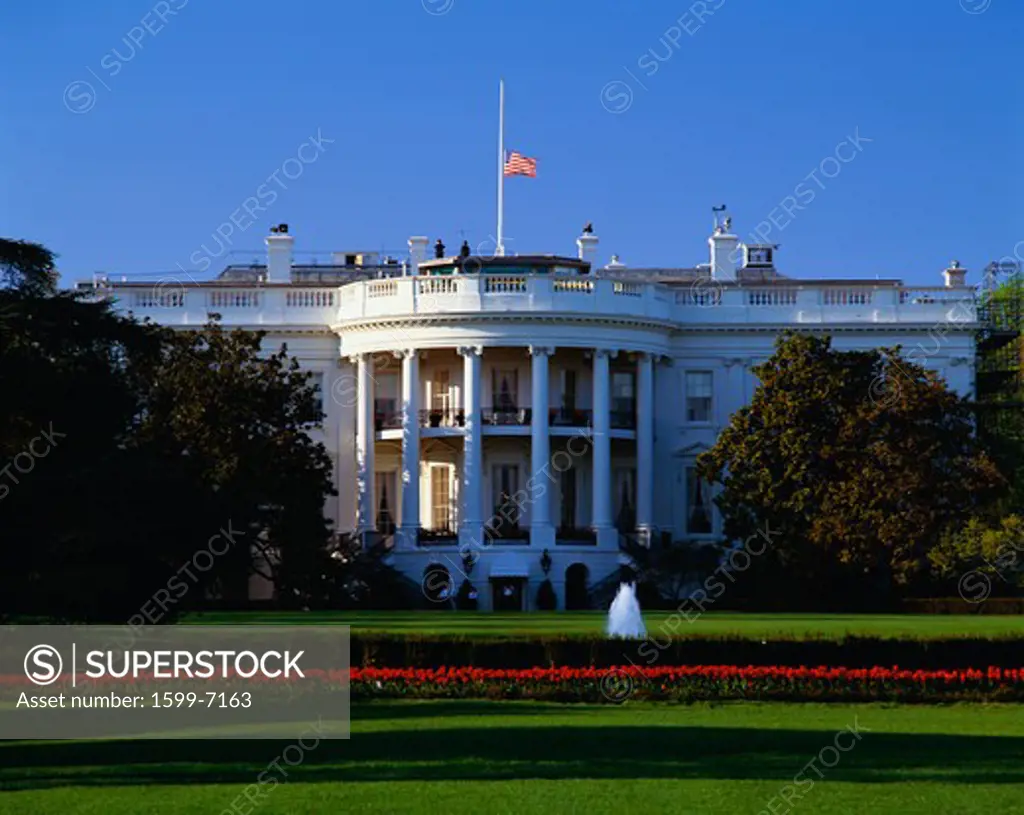 This is the White House in daylight during the summer. It is located on Pennsylvania Avenue. This is the home of the President of the United States.