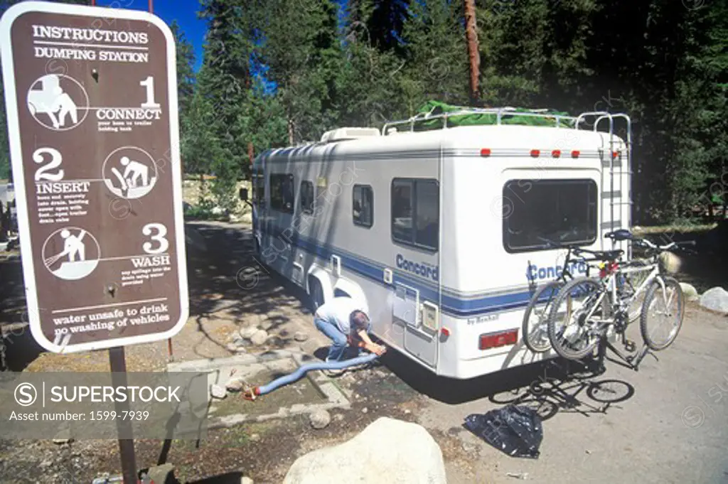 A recreation vehicle dumps its sewage in Sequoia National Park, California