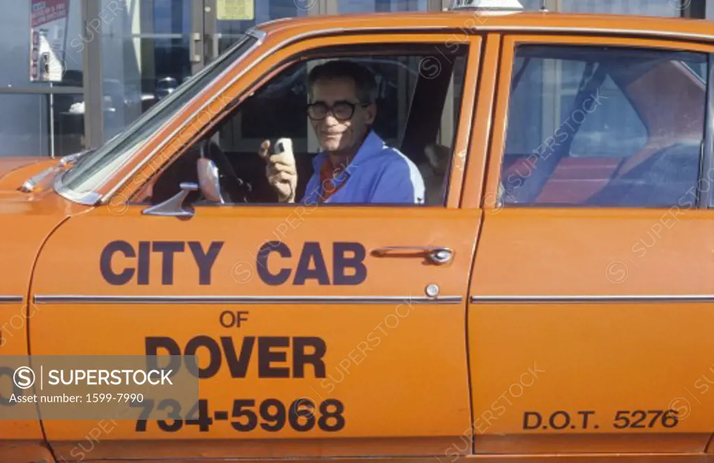 A man in an orange cab in Dover, Delaware