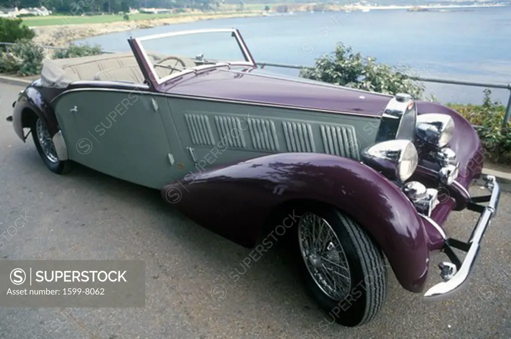 A  purple Bugatti at the 35th Annual Concours D' Elegance Competition in Carmel, CA
