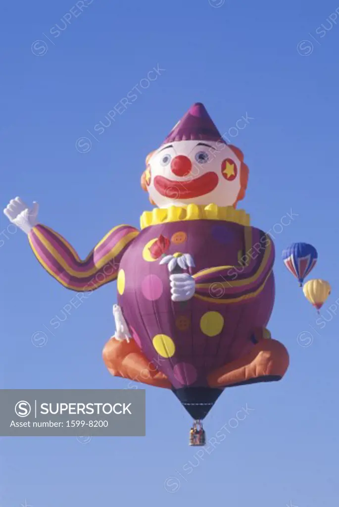 A hot air balloon shaped like a clown at the Albuquerque International Balloon Fiesta, Albuquerque, New Mexico