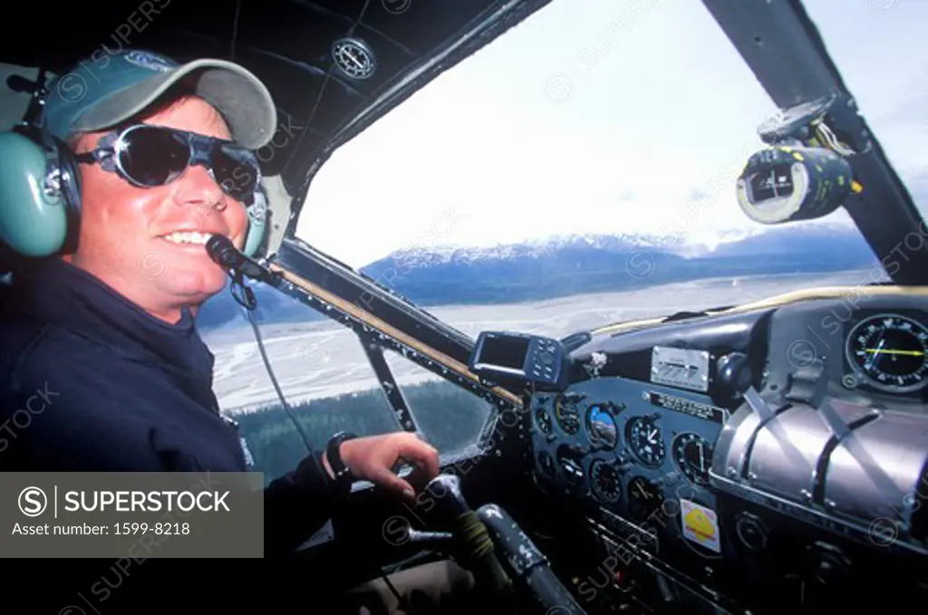 A bush pilot in a scout plane in Alaska
