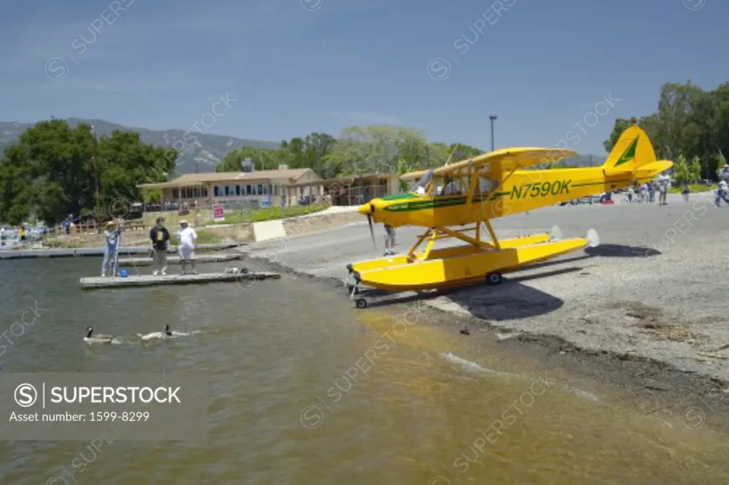 Yellow amphibious seaplane at Lake Casitas, Ojai, California