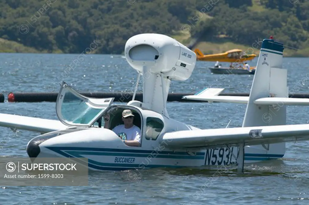 Amphibious seaplane taking off from Lake Casitas, Ojai, California