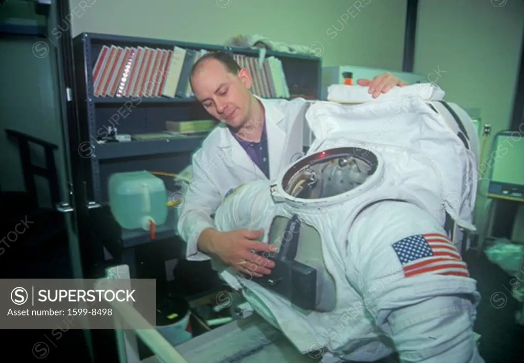 Technician demonstrates $1 million spacesuit at Space Camp, George C. Marshall Space Flight Center, Huntsville, AL